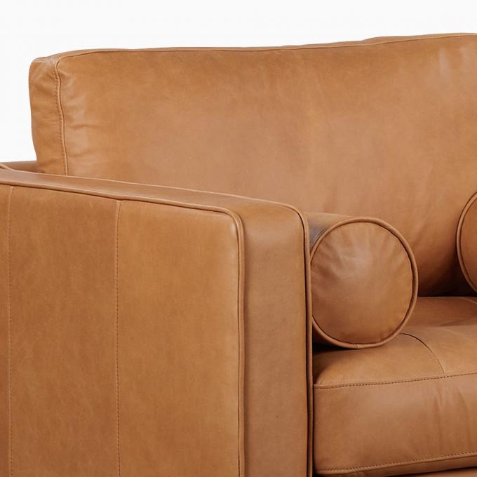 Chaise en cuir à bras de velours moderne avec tabouret ottoman 1
