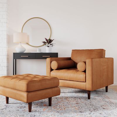 Chaise en cuir à bras de velours moderne avec tabouret ottoman